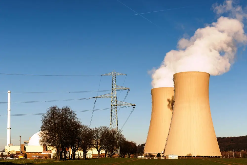 Power station cooling towers and transmission pylons
