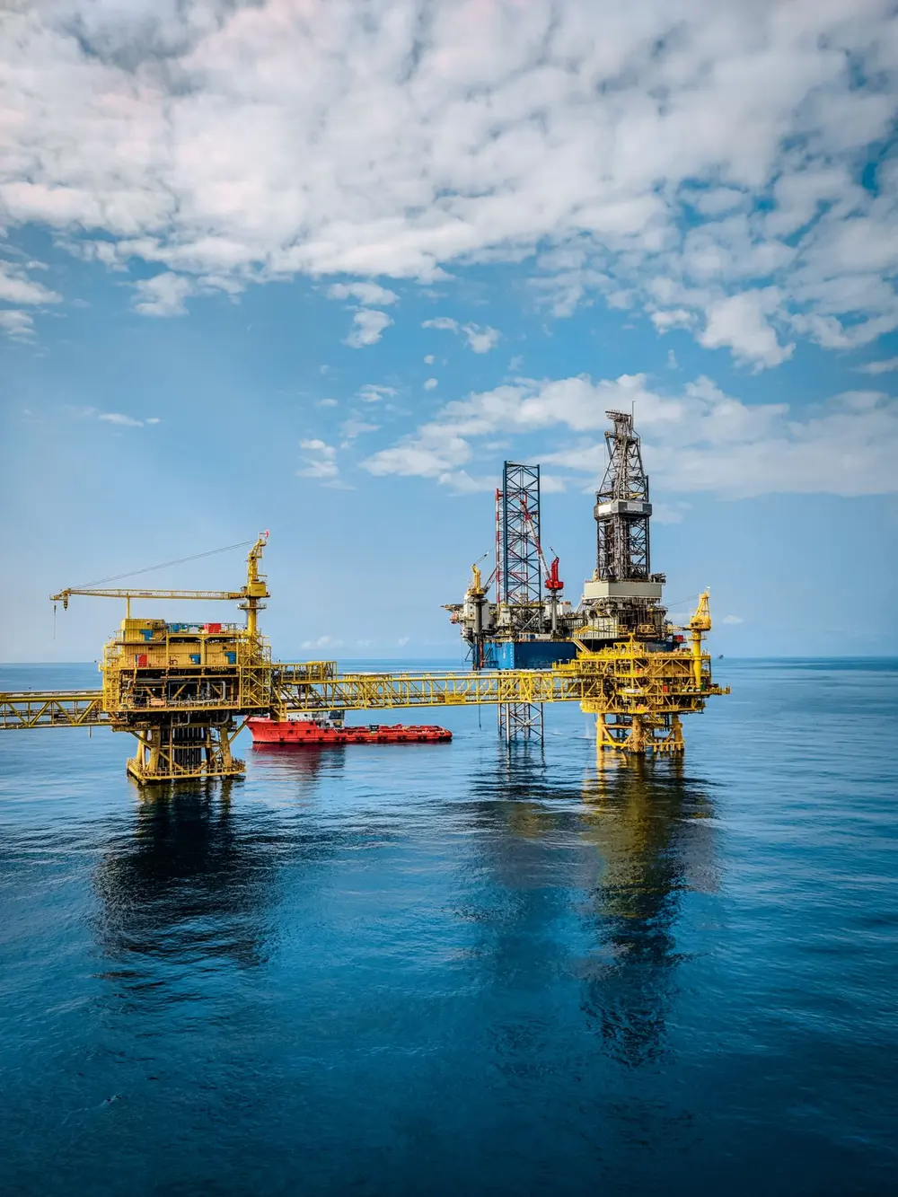 Offshore oil and gas platforms at sea